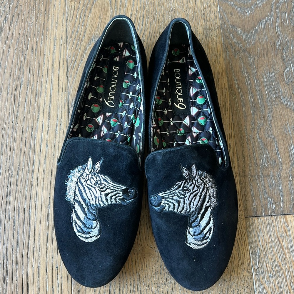 Boutique 9 black flats with embroidered zebra head